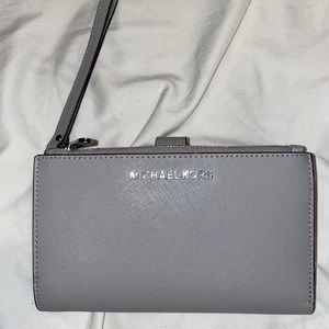 Grey Michael kors wristlet